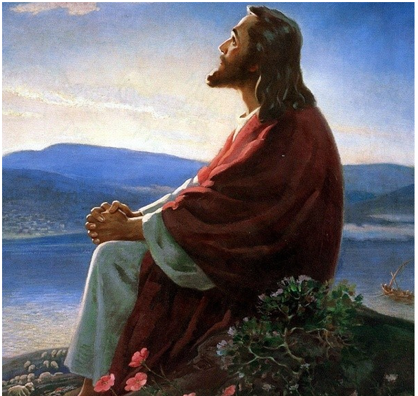 Jesus prie assis